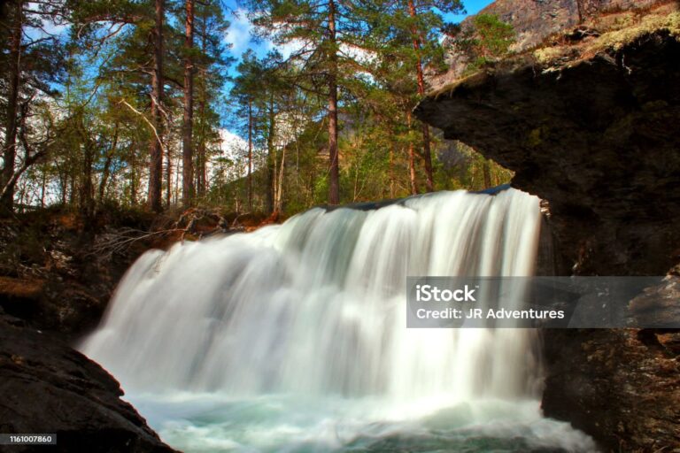 The waterfall is shot in the woods of Ulvik, Norway